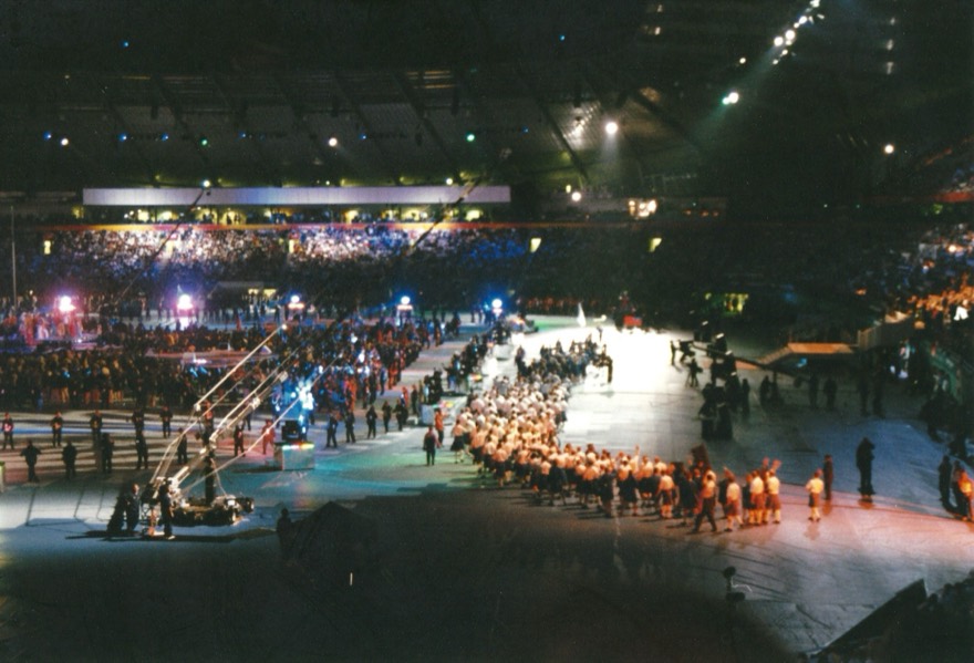 Athletes Parade during the 2002 Commonwealth Games Opening Ceremony. Athletes from Scotland are walking down the track.
Film photo taken with Miranda SLR camera