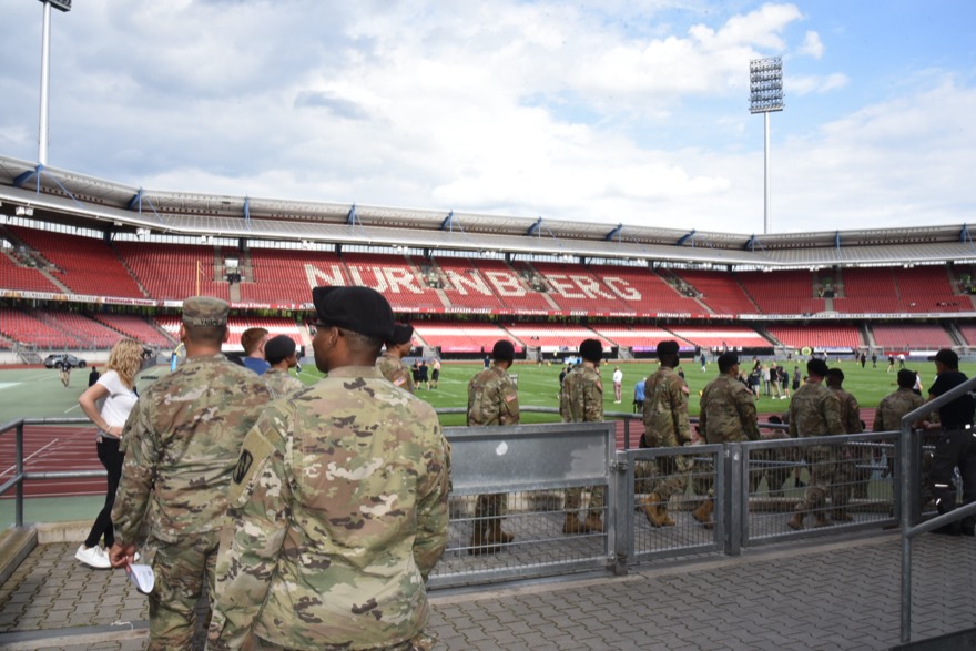 Soldiers of 7th Army Training Command (7ATC) and the United States Army Garrison Bavaria (USAG-Bavaria) attend the Munich Raven's Game in Nuremberg, Germany, Ju