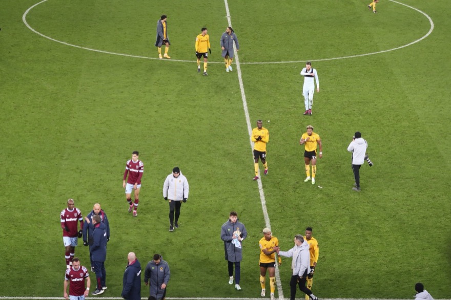Wolves players leaving the pitch at full time