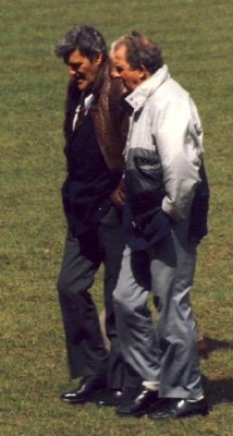 A picture of former Fulham players Jimmy Hill and Maurice Cook, standing on a football pitch.