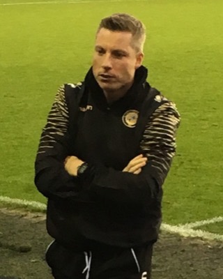 Millwall manager Neil Harris on the touchline in an FA Cup win over AFC Fylde.
