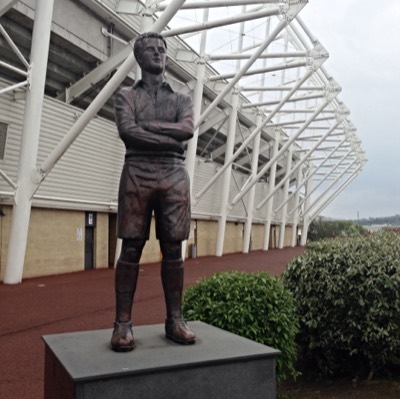 Statue of former professional footballer Ivor Allchurch outside the Liberty Stadium in Swansea, Wales